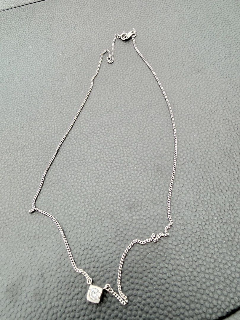 Platinum PT with diamond (Category: Necklaces) located in Manila. Submitted by agith21 (Listing ID 1468599646, Image 1). Description: - platinum chain necklace - Features a single sparkling diamond for a subtle shine - Delicate link chain with a secure spring ring clasp - Minimalist and versatile design, perfect for daily wear or layering.