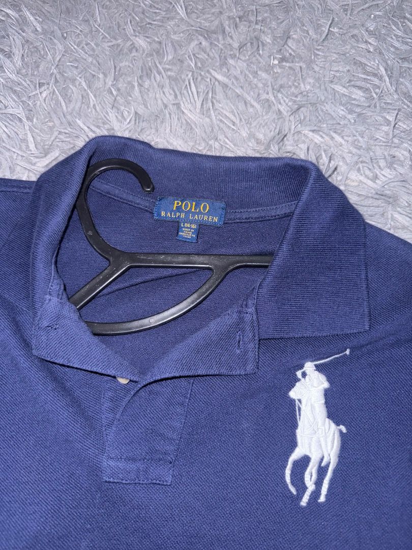 Polo Ralph Lauren Big Pony (Category: Tshirts & Polo Shirts ) located in Quezon City. Submitted by ashhaul (Listing ID 1468564688, Image 3). Description: - Brand: Polo Ralph Lauren - Color: Navy Blue with Large White Embroidered Pony Logo - Size: L (14-16) - Material: Comfortable & breathable cotton pique fabric - Design: Classic collar with a two-button placket - Condition: Excellent, classic casual staple.