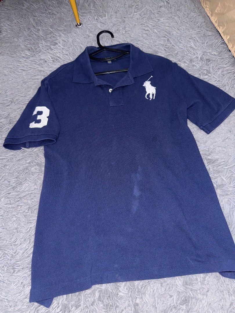 Polo Ralph Lauren Big Pony (Category: Tshirts & Polo Shirts ) located in Quezon City. Submitted by ashhaul (Listing ID 1468564688, Image 1). Description: - Brand: Polo Ralph Lauren - Color: Navy Blue with Large White Embroidered Pony Logo - Size: L (14-16) - Material: Comfortable & breathable cotton pique fabric - Design: Classic collar with a two-button placket - Condition: Excellent, classic casual staple.