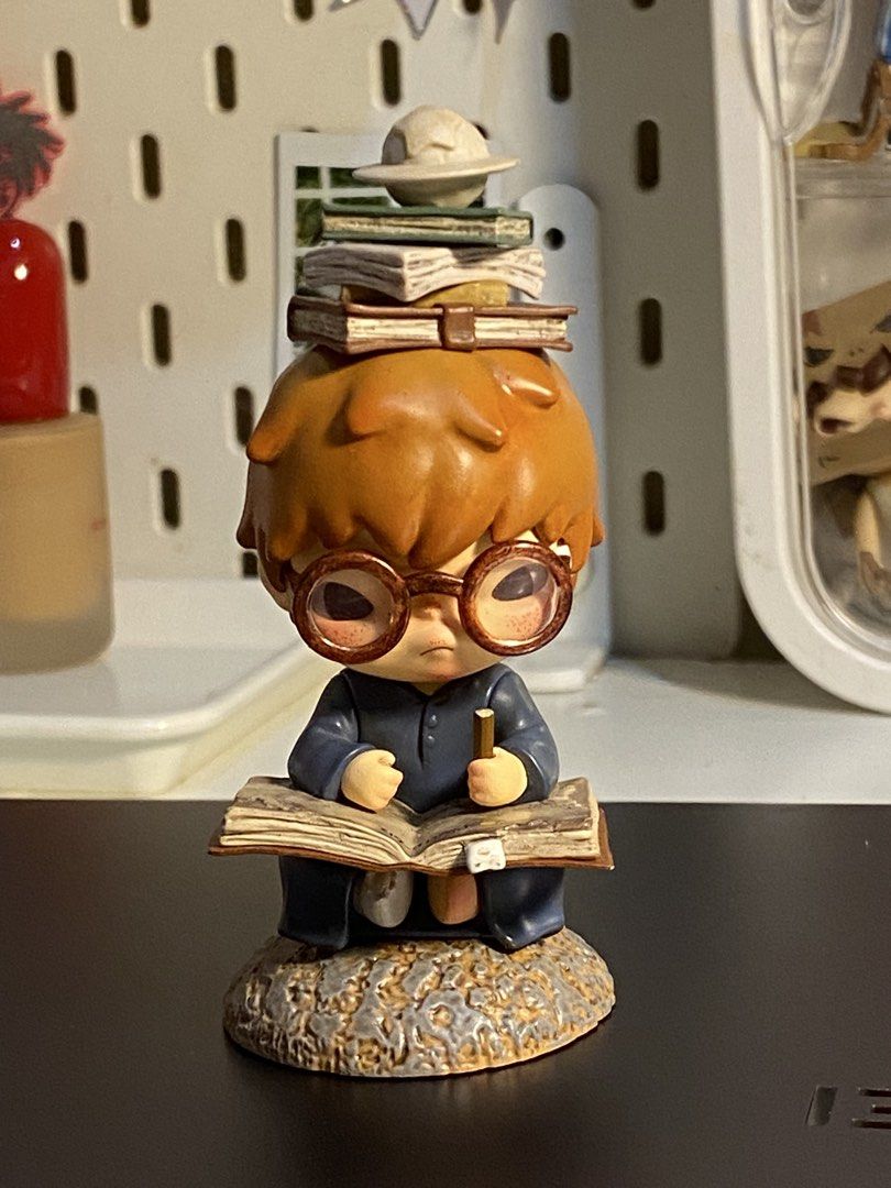 POP MART Hirono Figurine Scholar Reader Desk Decor (Category: Designer & Blind Box Toys) located in Malolos. Submitted by luvvtinx (Listing ID 1468603421, Image 1). Description: - with card only.