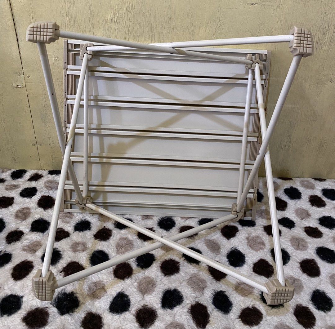 Portable Foldable Camping Table Aluminium Slat Top (Category: Hiking & Camping) located in Baguio. Submitted by thrift_bonita (Listing ID 1468553115, Image 2). Description: - Compact folding table with roll-up slat top and X-frame metal legs - Lightweight, easy to set up, and packs down small - Ideal for camping trips, picnics, or outdoor markets - Neutral beige and white color scheme matches most outdoor gear - Sturdy and durable construction.