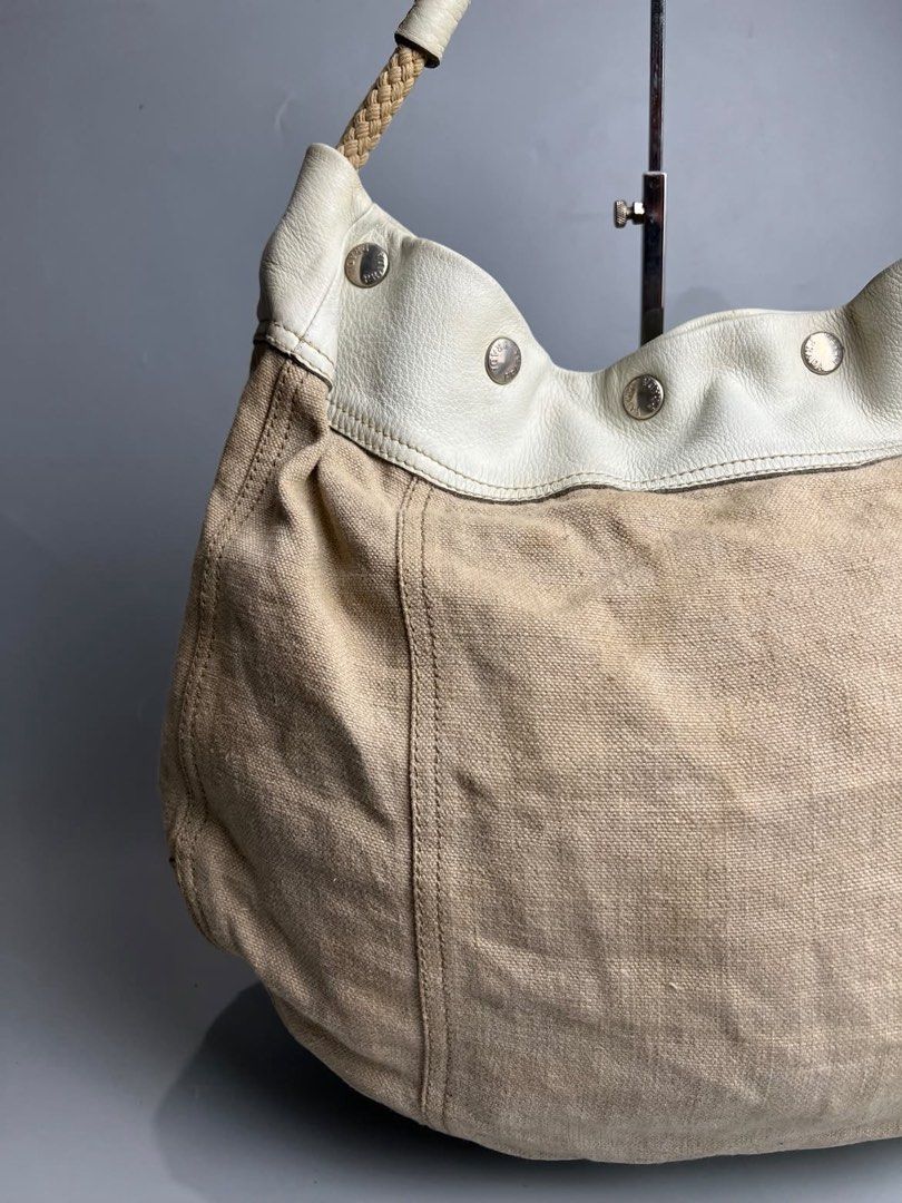 Prada - Rope Handle Fringe - Hobo Bag (Category: Luxury Bags & Wallets) located in San Pablo. Submitted by hiddenrygn (Listing ID 1468516896, Image 2). Description: Prada - Rope Handle Fringe - Hobo Bag Rank AB Missing 1 button Still in good condition Authentic DM!.