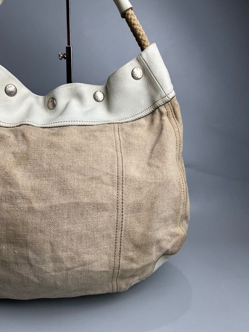 Prada - Rope Handle Fringe - Hobo Bag (Category: Luxury Bags & Wallets) located in San Pablo. Submitted by hiddenrygn (Listing ID 1468516896, Image 3). Description: Prada - Rope Handle Fringe - Hobo Bag Rank AB Missing 1 button Still in good condition Authentic DM!.
