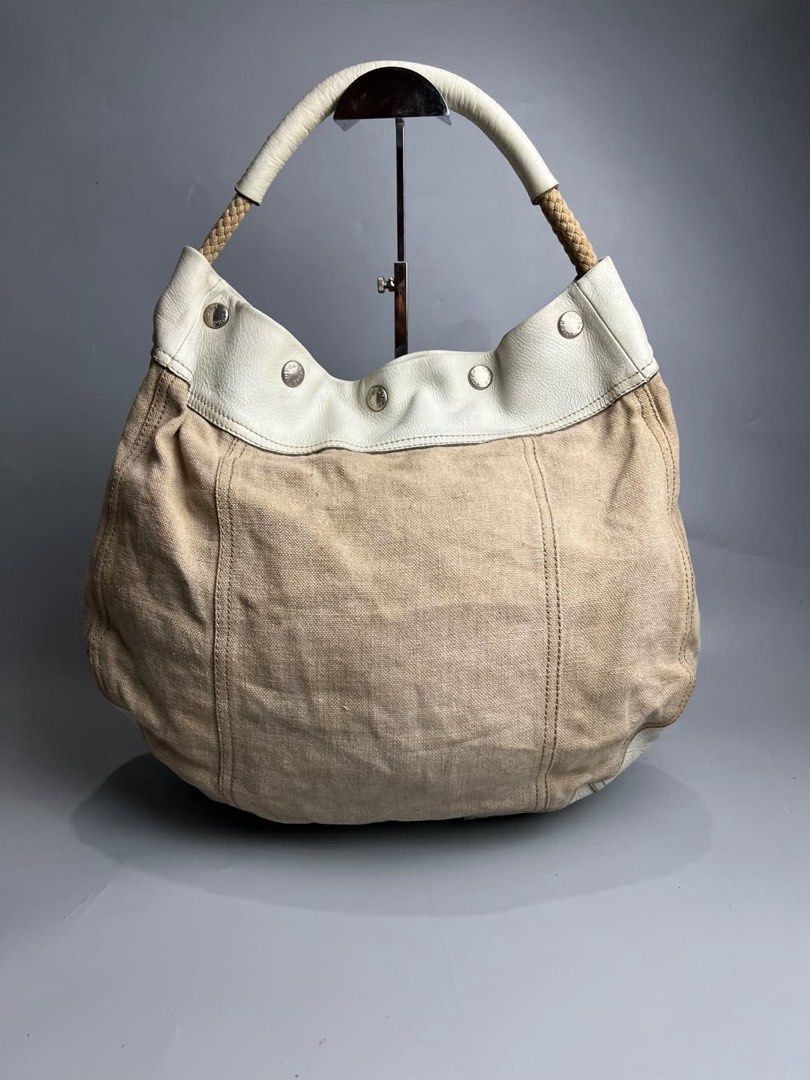 Prada - Rope Handle Fringe - Hobo Bag (Category: Luxury Bags & Wallets) located in San Pablo. Submitted by hiddenrygn (Listing ID 1468516896, Image 1). Description: Prada - Rope Handle Fringe - Hobo Bag Rank AB Missing 1 button Still in good condition Authentic DM!.