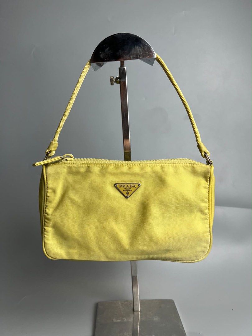 Prada - Tessuto nylon Pochette (Category: Luxury Bags & Wallets) located in San Pablo. Submitted by hiddenrygn (Listing ID 1468502840, Image 1). Description: Prada - Tessuto nylon Pochette Rank AB Minor signs of usage Still in excellent condition Authentic DM!.