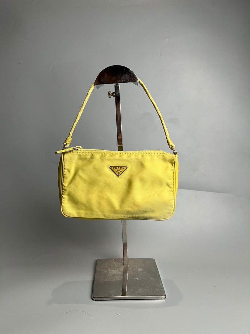 Prada - Tessuto nylon Pochette (Category: Luxury Bags & Wallets) located in San Pablo. Submitted by hiddenrygn (Listing ID 1468502840, Image 2). Description: Prada - Tessuto nylon Pochette Rank AB Minor signs of usage Still in excellent condition Authentic DM!.