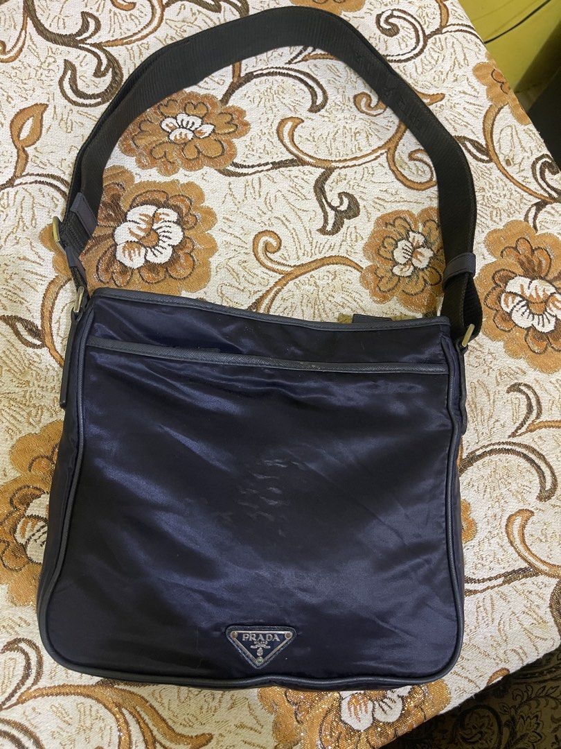 Prada Bag (Category: Sling Bags) located in Marikina City. Submitted by greatfindsmnlph (Listing ID 1468684868, Image 2). Description: Pra da Bag Price: 350 Size: Medium Width: 12.5 Length: 11 Color: Blue Color Rate: 10/10 Condition: 9.5/10 with minor flaws Very nice in actual.