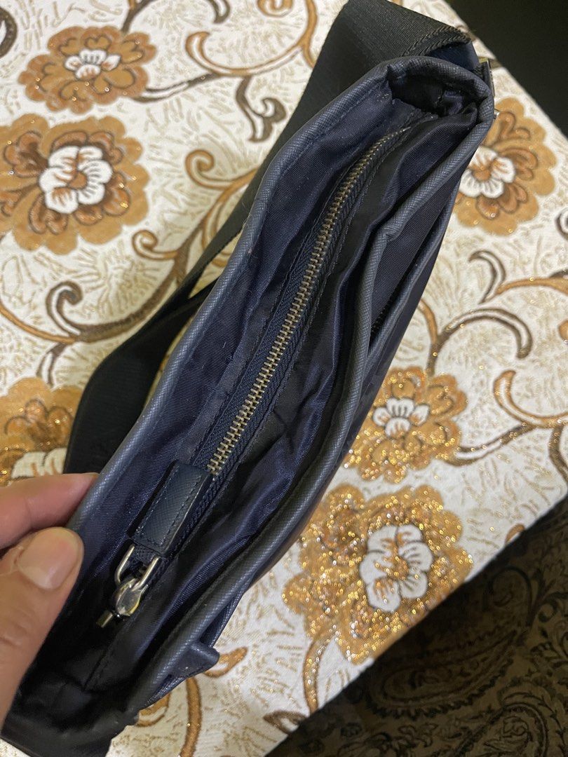 Prada Bag (Category: Sling Bags) located in Marikina City. Submitted by greatfindsmnlph (Listing ID 1468684868, Image 3). Description: Pra da Bag Price: 350 Size: Medium Width: 12.5 Length: 11 Color: Blue Color Rate: 10/10 Condition: 9.5/10 with minor flaws Very nice in actual.