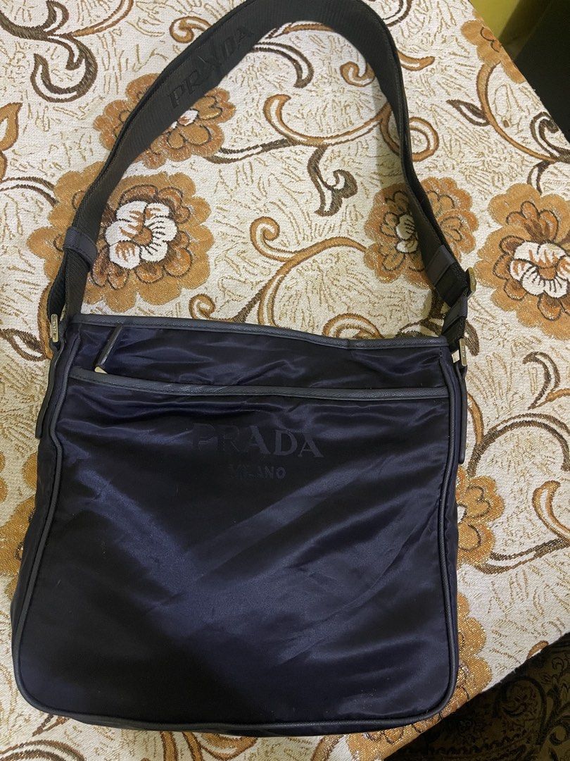 Prada Bag (Category: Sling Bags) located in Marikina City. Submitted by greatfindsmnlph (Listing ID 1468684868, Image 1). Description: Pra da Bag Price: 350 Size: Medium Width: 12.5 Length: 11 Color: Blue Color Rate: 10/10 Condition: 9.5/10 with minor flaws Very nice in actual.