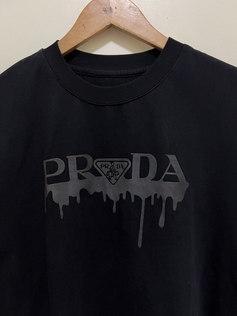 Prada Black Shirt (Category: Luxury Apparel) located in Manila. Submitted by thriftpoint99 (Listing ID 1468642578, Image 2). Description: 20.5x26 No tags only Heavy cloth Excellent condition.