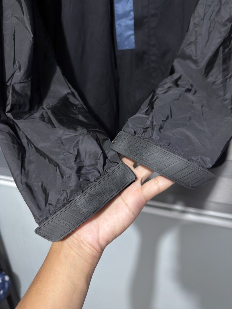 Prada black zip-up nylon jacket (Category: Coats, Jackets and Outerwear) located in Calumpit. Submitted by Essentiality (Listing ID 1468644824, Image 2). Description: Prada black zip-up nylon jacket 21x26.5 ₱2,500.