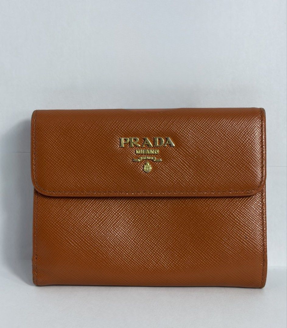 Prada Flap Wallet (Category: Luxury Bags & Wallets) located in Pasig City. Submitted by fjrd_relovedluxury28 (Listing ID 1468629607, Image 1). Description: .