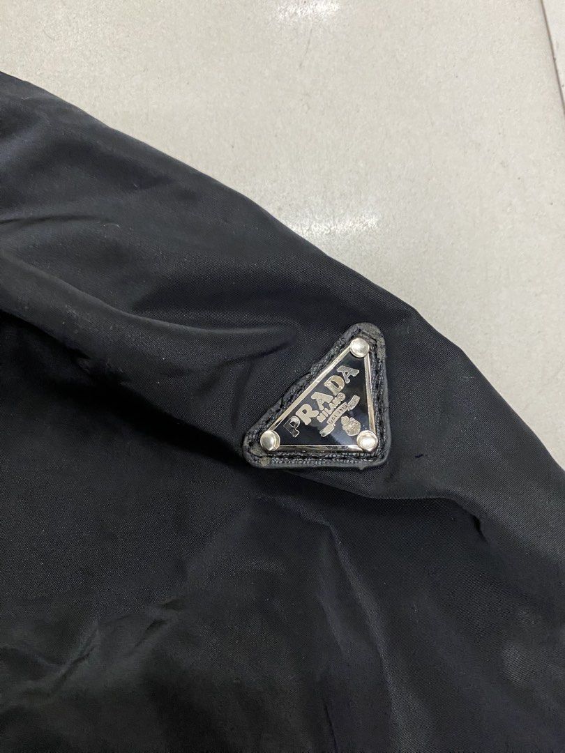 Prada nylon jacket for her (Category: Coats, Jackets and Outerwear) located in Manila. Submitted by ercmrsmam (Listing ID 1468663364, Image 3). Description: PR4DA NYLON JACKET FOR HER W 21 L 28 Cr 9.5 Excellent condition 📍BACLARAN PARANAQUE 🛵 JNT/ LBC/ LALAMOVE 💵 GCASH/ PAYMENT FIRST.