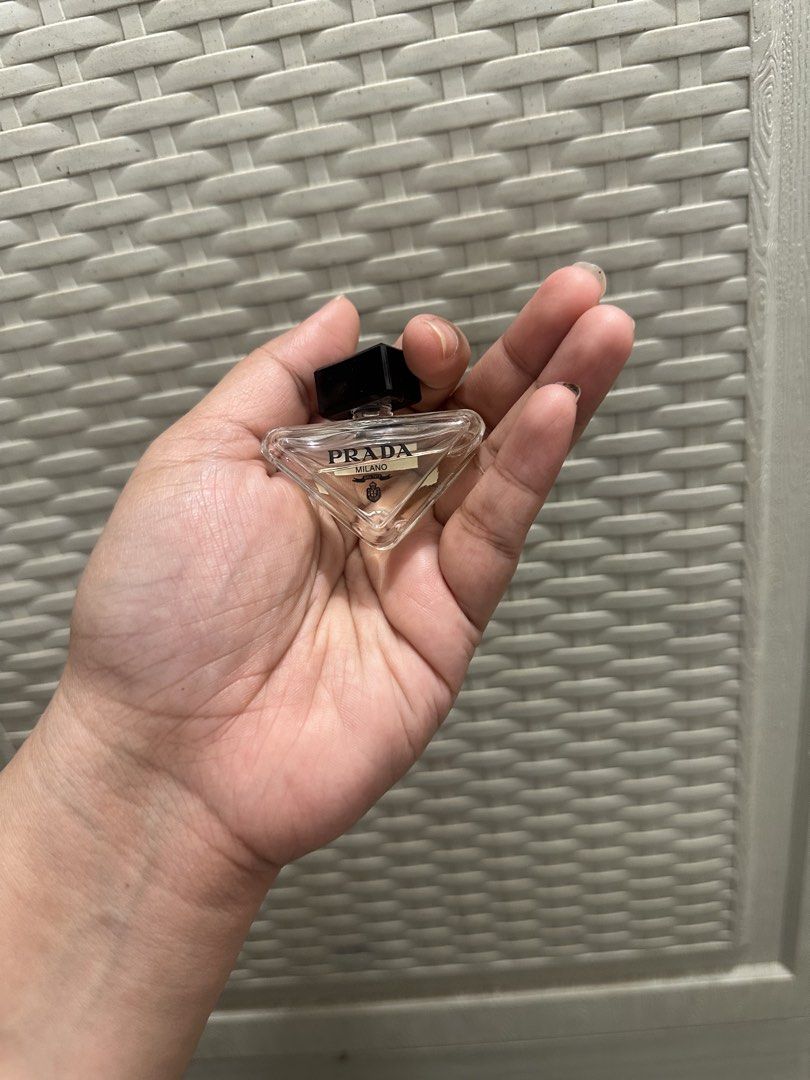 Prada Paradoxe Miniature Perfume Triangle Bottle (Category: Fragrance & Deodorants) located in Manila. Submitted by nihn02 (Listing ID 1468500952, Image 1). Description: - Authentic Prada Paradoxe mini perfume - Condition: About half full - Design: Iconic triangular clear glass with black cap and Prada Milano branding - Type: Standard splash bottle (no spray nozzle) - Perfect for trying out the scent or for miniature perfume collectors.