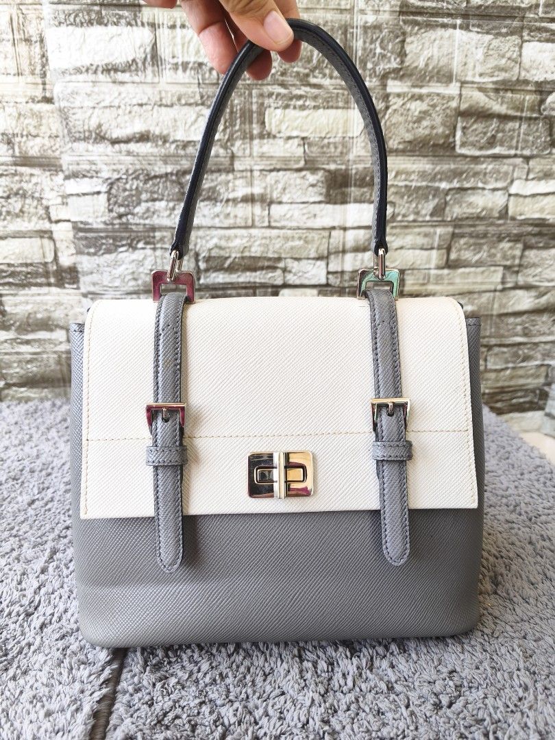 Prada Saffiano Leather Handbag (Category: Luxury Bags & Wallets) located in Taytay. Submitted by rgun28 (Listing ID 1468564777, Image 1). Description: 🍀 PRADA SAFFIANO TWO TONE BAG🍀 💯% guaranteed original 𝐂𝐨𝐧𝐝𝐢𝐭𝐢𝐨𝐧: In very good used condition/ Rank A-AB. See photos to appreciate.. Money back guaranteed if proven fake by Entrupy. As is where is..NO RETURN!! NO EXCHANGE!! 🔸Before purchasing, please refer to the images for the exact co