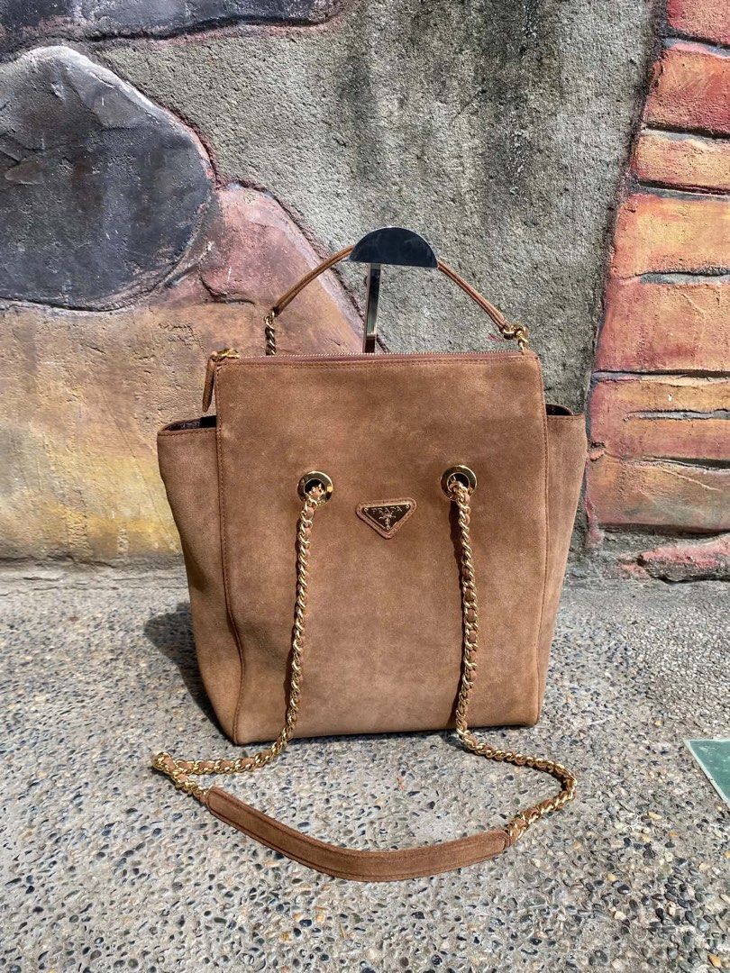 Prada suede chain (Category: Luxury Bags & Wallets) located in Dagupan City. Submitted by retro.plug (Listing ID 1468708977, Image 1). Description: .