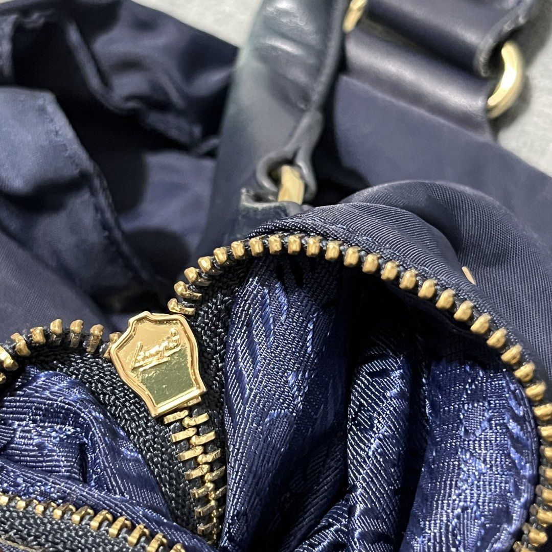 prada tessuto bag (Category: Luxury Bags & Wallets) located in Malay. Submitted by oplt_dept. (Listing ID 1468610805, Image 3). Description: -honest flaws(see pics) -luxury essentials -width:16 -length:10.5 .