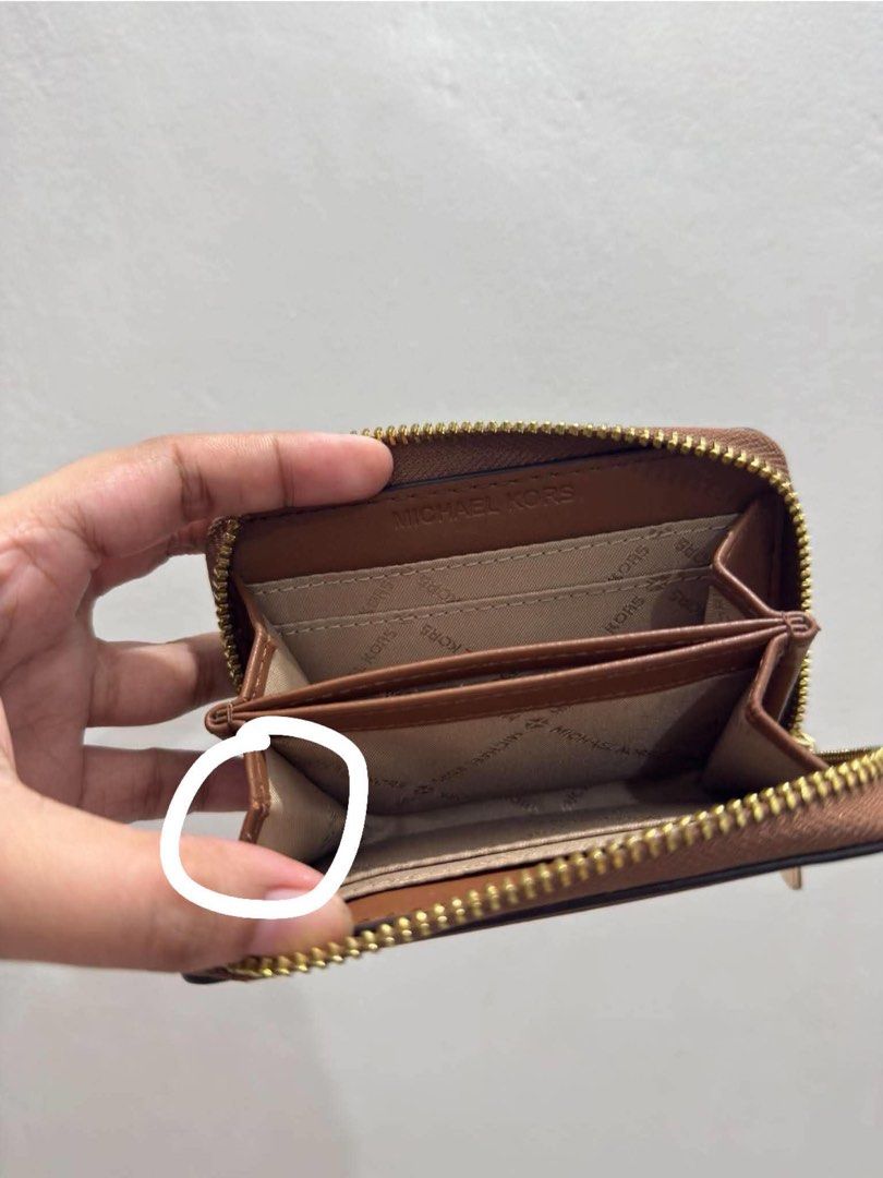 preloved authentic michael kors wallet (Category: Luxury Bags & Wallets) located in Manila. Submitted by etherealixcart (Listing ID 1468521834, Image 3). Description: preloved authentic michael kors wallet selling for 2k no inclusions & flaws can be seen in pic can ship thru j&t or lalamove gcash or maya .