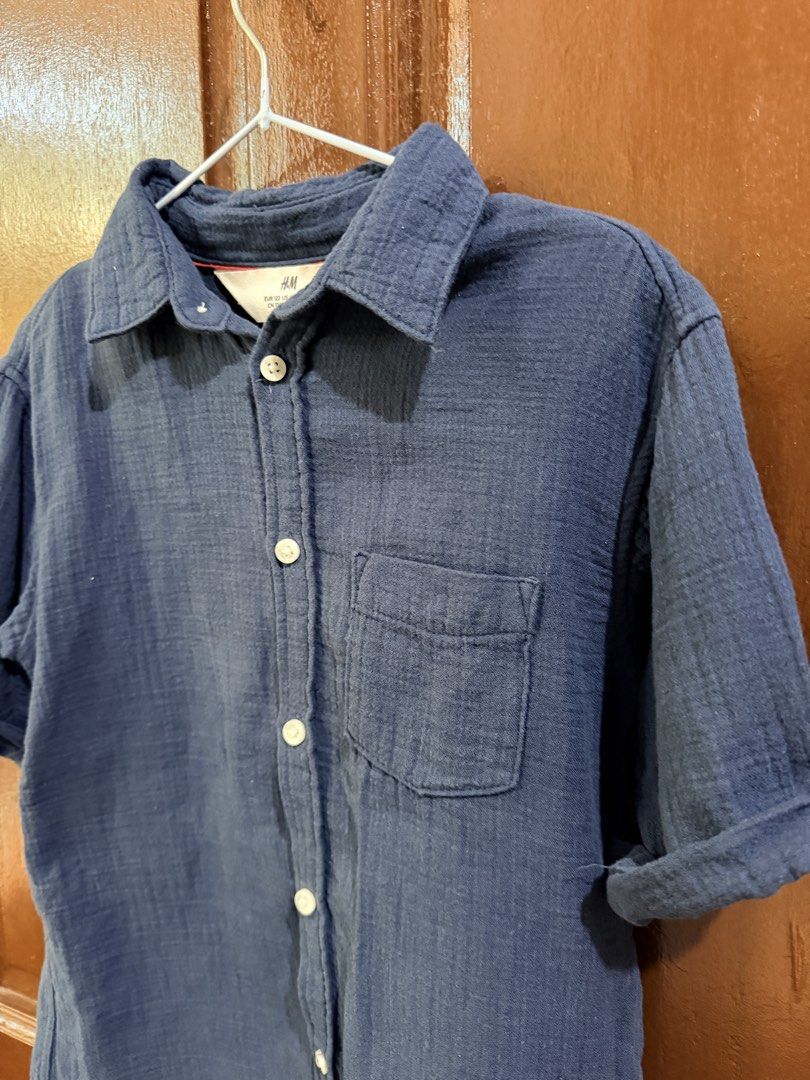 Pre-loved H&M Button Down Polo for Boys (Category: Babies & Kids Fashion) located in Muntinlupa City. Submitted by sashaloves (Listing ID 1468508475, Image 3). Description: Pre-loved H&M Button Down Polo for Boys Size on tag: 6-7Y Color: Navy In used good condition Complete buttons | With front pocket Please manage your expectations. You are considering a used item. MOP: BPI | GCash | Maribank No COD/COP. SF c/o miner..