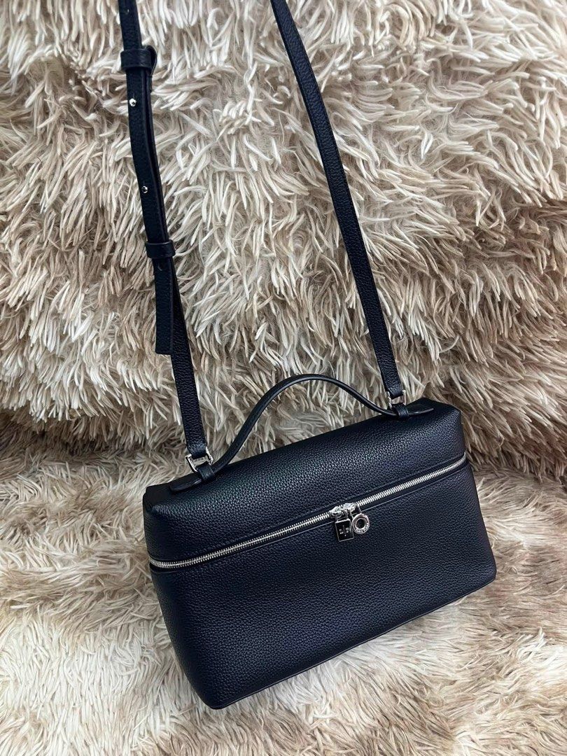 Preloved LP Extra Pocket Bag (Category: Luxury Bags & Wallets) located in Manila. Submitted by bagsandmanymanymore1 (Listing ID 1468589952, Image 2). Description: Preloved Extra Pocket Loro Piana Size 26cm Antique silver Leather handle and shoulder strap Lambskin 100% lining Double slider zipper closure with My Charms Rare to find Please read before you order 👉🏻❗️Payment first before shipping ❗️Cut off time of payment 11am sameday delivery ❗️NO