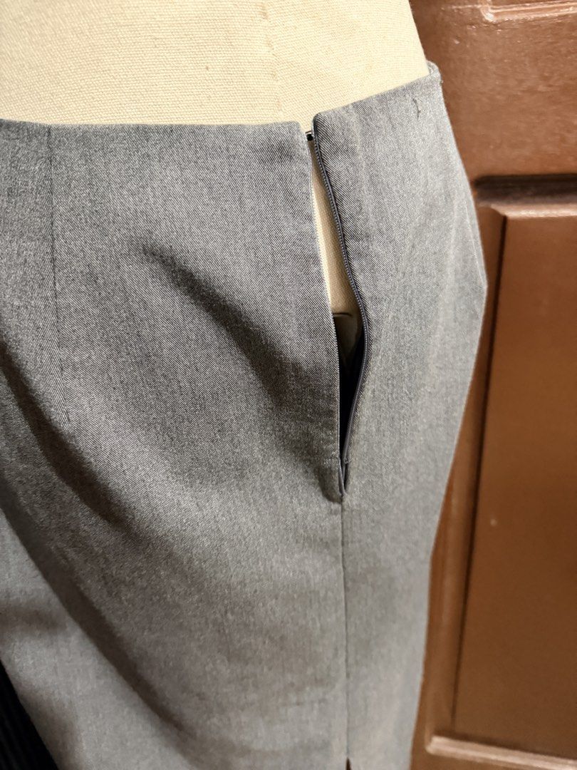 Pre-loved Memo Midi Skirt (Category: Skirts) located in Muntinlupa City. Submitted by sashaloves (Listing ID 1468592610, Image 3). Description: Pre-loved Memo Midi Skirt Size on tag: Medium Color: Grey Broken zipper at the back In good condition except the need for zipper Please manage your expectations. You are considering a used item. SF c/o Miner.