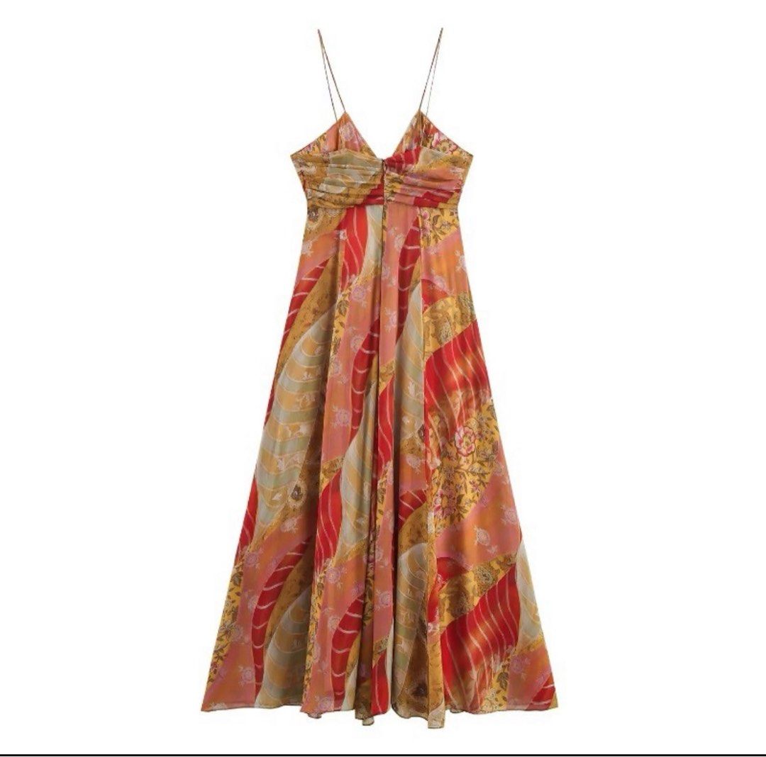 Printed Halter Maxi Dress (Category: Dresses) located in Manila. Submitted by gwengaite (Listing ID 1468532091, Image 2). Description: Used only once Bust -34” Waist- 28-29”.