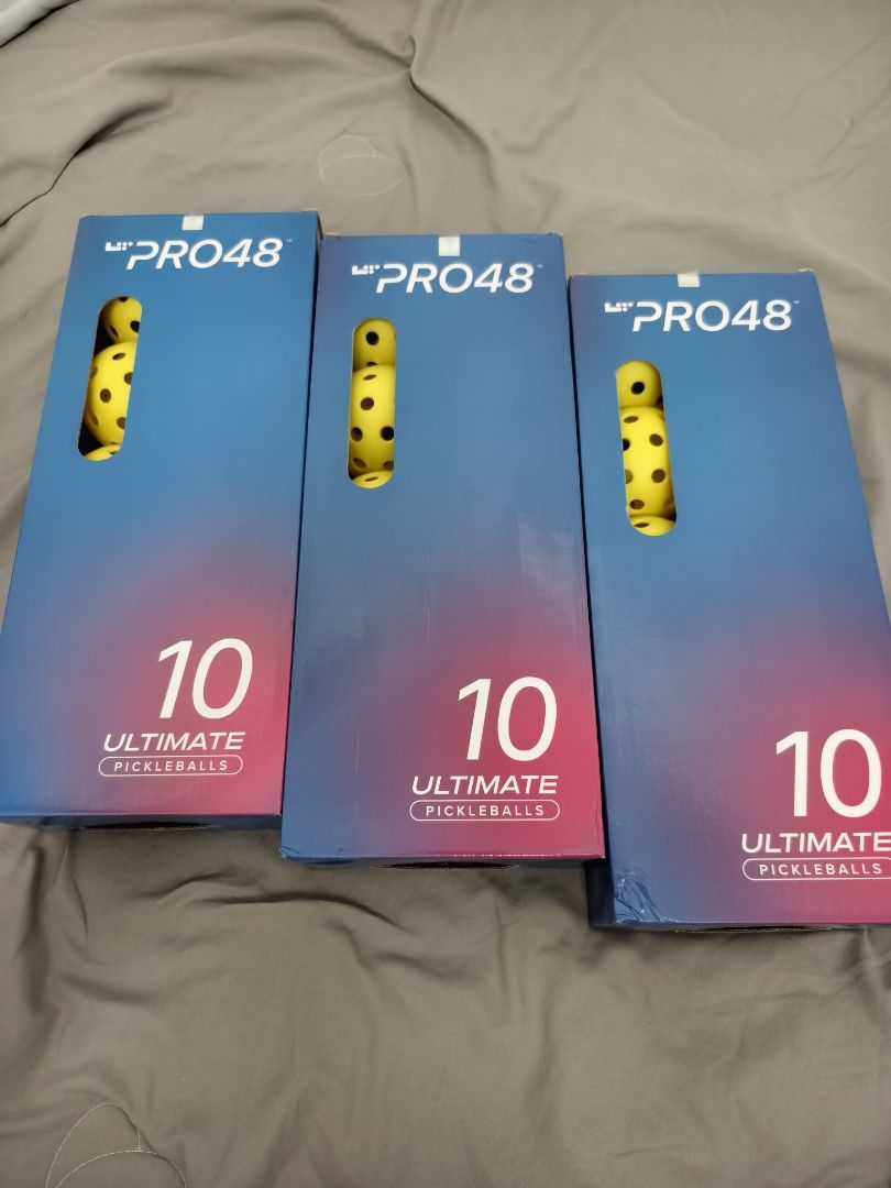 PRO48 Ultimate Pickleballs Box (Category: Racket and Ball Sports) located in Angeles City. Submitted by measaliman02351 (Listing ID 1468553326, Image 2). Description: - Brand: PRO48 Ultimate Pickleballs - Quantity: 3 boxes (10 balls per box, total of 30 balls) - Type: Outdoor pickleballs with holes, bright yellow - Condition: Brand new, unopened, and in clean packaging - Perfect for regular players and tournaments 2000 per box.