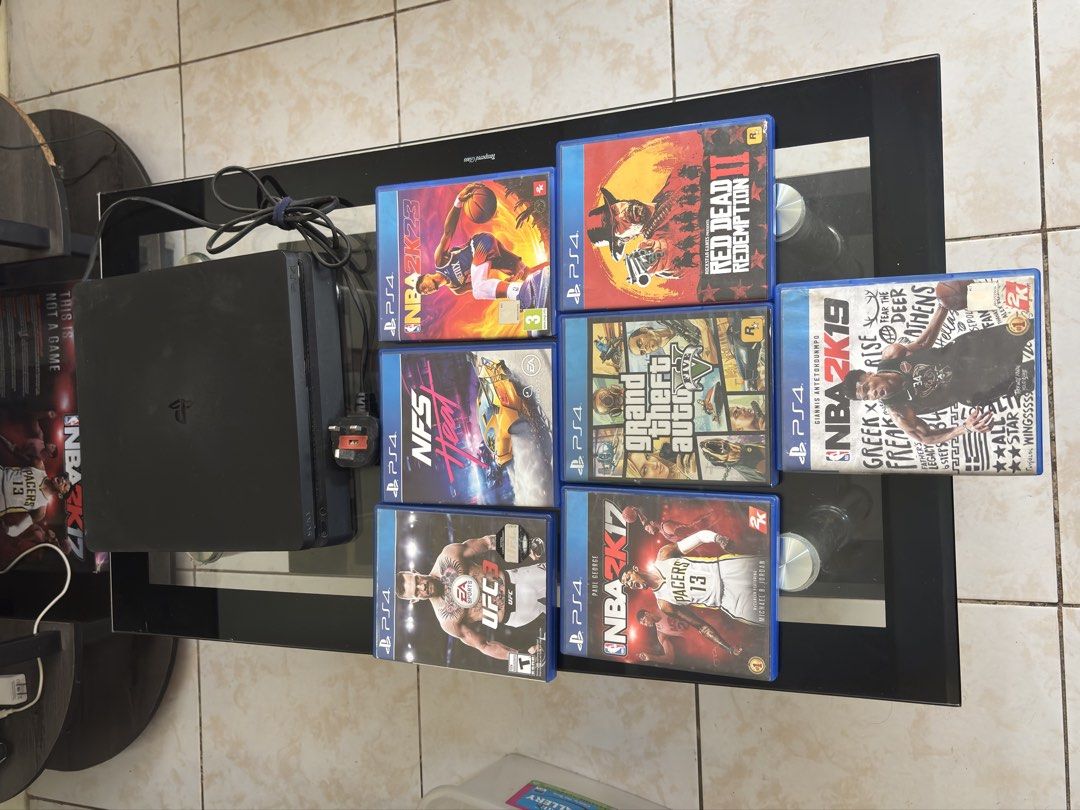 PS4 SLIM (Category: PlayStation) located in Manila. Submitted by izzyc.18 (Listing ID 1468608970, Image 1). Description: 🎮 FOR SALE: PS4 + GAMES Selling my personally owned and used PS4 with games. Condition: • Fully working • No jailbreak • Updated to the latest system software • No history of repair or opening • Visible slight accumulated dust from normal use Issues: • Power button is slightly loose but still works fine • No controller include