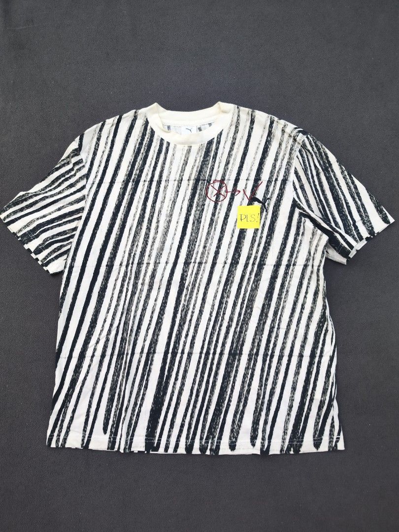 Puma AOP Tee (Category: Tshirts & Polo Shirts ) located in Bulacan. Submitted by emilj23 (Listing ID 1468520199, Image 1). Description: Puma AOP Tee Size M on tag L 28 W 23 Condition 9/10 Color rate 9/10 Issue Yellowish Neckline.