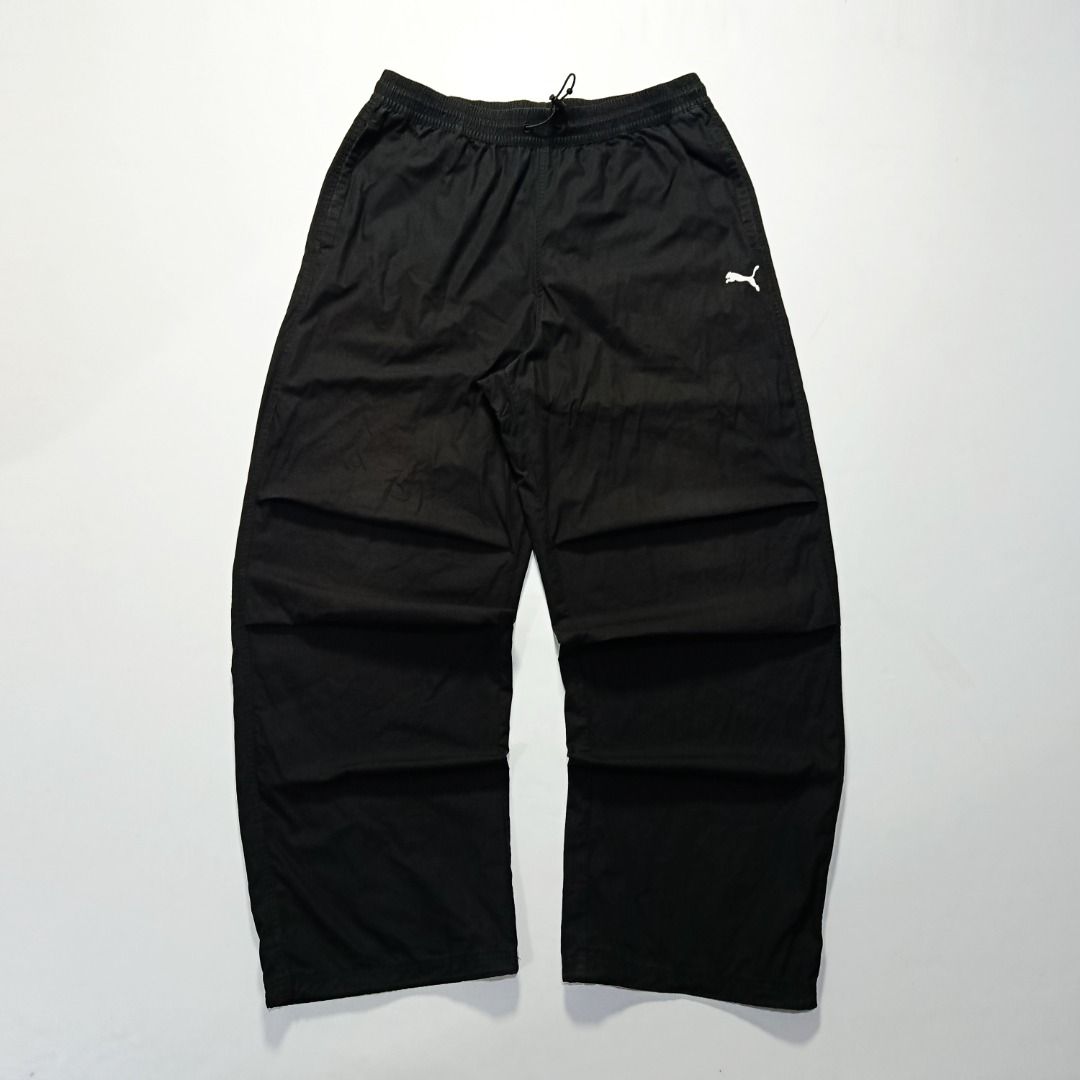 Puma Baggy Cargo Jogger Pants (Category: Joggers) located in Taytay. Submitted by hoodgrail.vtg (Listing ID 1468607208, Image 1). Description: • Excellent condition - Lightly used • Main standout detail: Baggy cargo construction with textured ripstop fabric and embroidered Puma logo • Size on tag: XL — best fits W31–33 • Measurements: 15.5 x 41 in • Leg opening: 10 in • Color rate: 9.5/10 • Issue: None.