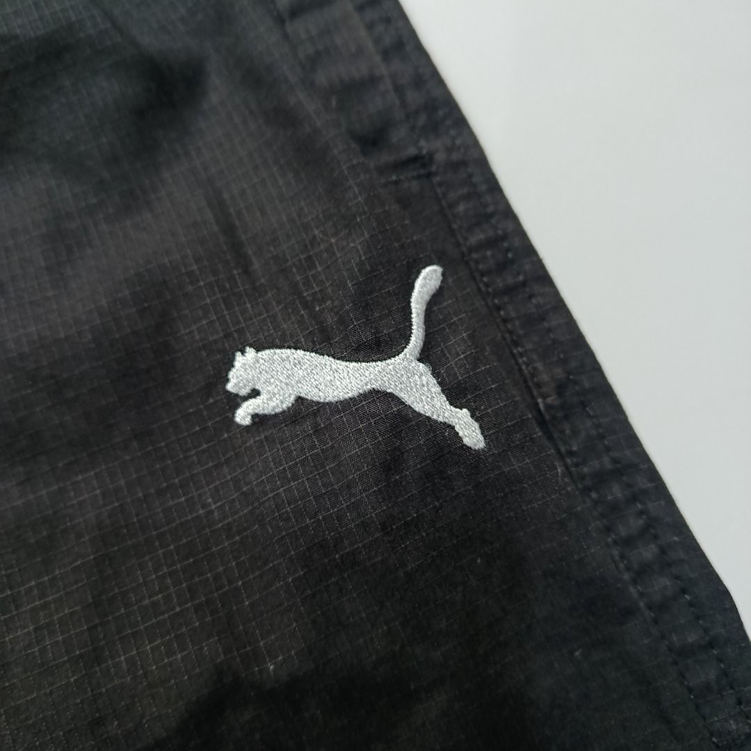 Puma Baggy Cargo Jogger Pants (Category: Joggers) located in Taytay. Submitted by hoodgrail.vtg (Listing ID 1468607208, Image 3). Description: • Excellent condition - Lightly used • Main standout detail: Baggy cargo construction with textured ripstop fabric and embroidered Puma logo • Size on tag: XL — best fits W31–33 • Measurements: 15.5 x 41 in • Leg opening: 10 in • Color rate: 9.5/10 • Issue: None.