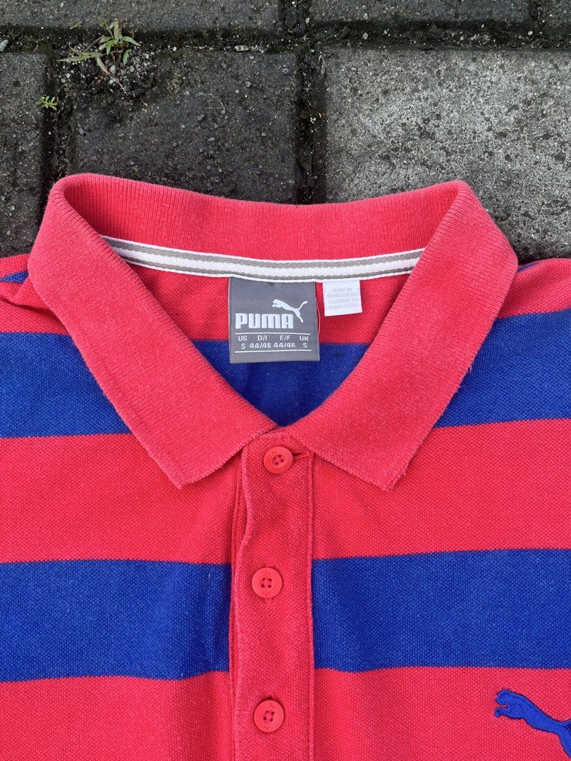 Puma Men's Striped Pieque Polo Red Blue (Category: Tshirts & Polo Shirts ) located in Manila. Submitted by mikko. (Listing ID 1468604419, Image 2). Description: Puma short - sleeve polo in red & blue stripes Authentic With complete tags With extra button Embroidered puma logo Made in Bangladesh No pinhole No scratch W - 19 L - 27 Pm pm.