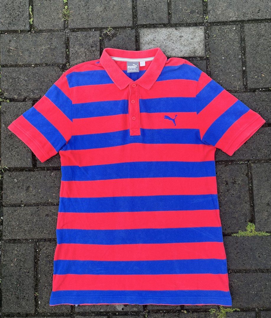 Puma Men's Striped Pieque Polo Red Blue (Category: Tshirts & Polo Shirts ) located in Manila. Submitted by mikko. (Listing ID 1468604419, Image 1). Description: Puma short - sleeve polo in red & blue stripes Authentic With complete tags With extra button Embroidered puma logo Made in Bangladesh No pinhole No scratch W - 19 L - 27 Pm pm.