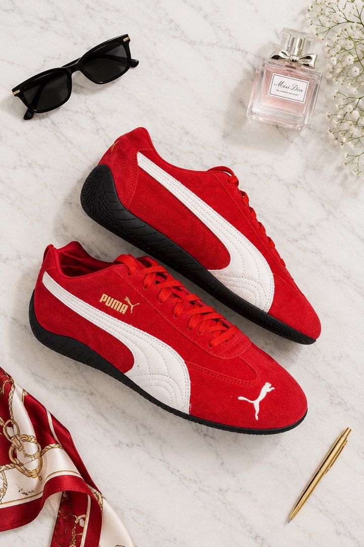 Puma Speedcat OG for all the time Red/White (Category: Sneakers) located in Cebu City. Submitted by relovedfinds.ph (Listing ID 1468517335, Image 1). Description: The Puma Speedcat OG in Red/White features a vibrant red suede upper accented with signature white side stripes, matching red laces, gold Puma branding, and the iconic white leaping cat logo near the toe. Designed with contrast stitching and a textured black rubber wrap-around sole exte