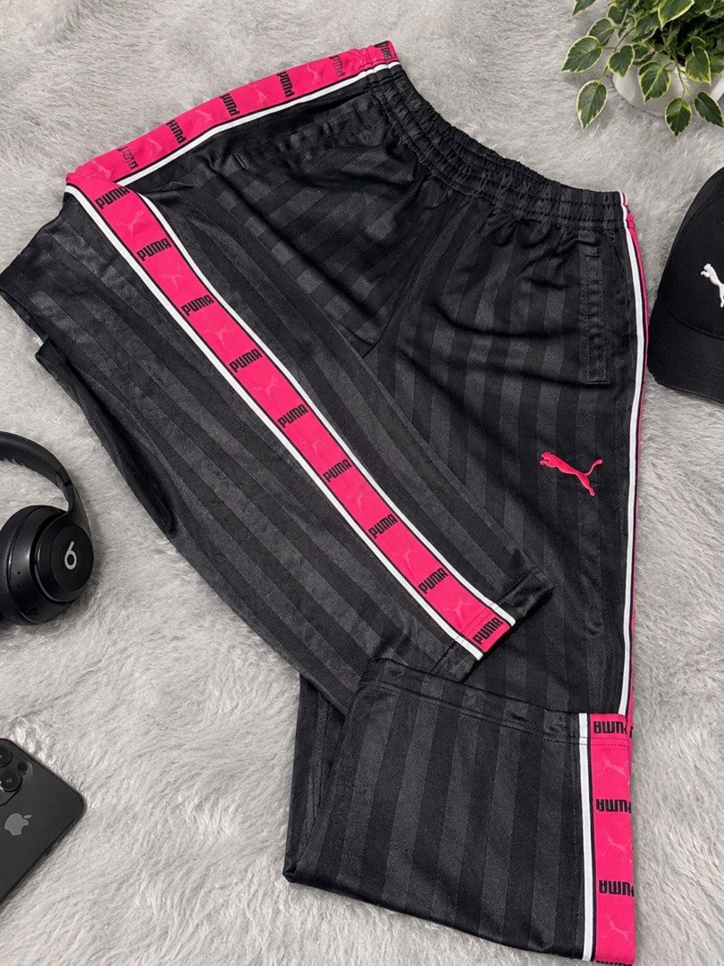 PUMA TRACK PANTS (Category: Other Bottoms) located in Marikina City. Submitted by sunshine_22 (Listing ID 1468664081, Image 2). Description: 🩶💗 PUMA TRACK PANTS FOR SALE! 💗🩶 Sporty, comfy & perfect for your OOTD! 🎀✨ 🩶 Charcoal gray with hot pink details 👖 Waist: 26–30 inches 📏 Length: 39 inches ✨ Stretchable waistband 💗 Pink PUMA side stripes 👟 Perfect for casual wear & streetwear outfits 📩 DM for price and inquiries! 🛍️ Mine yours no
