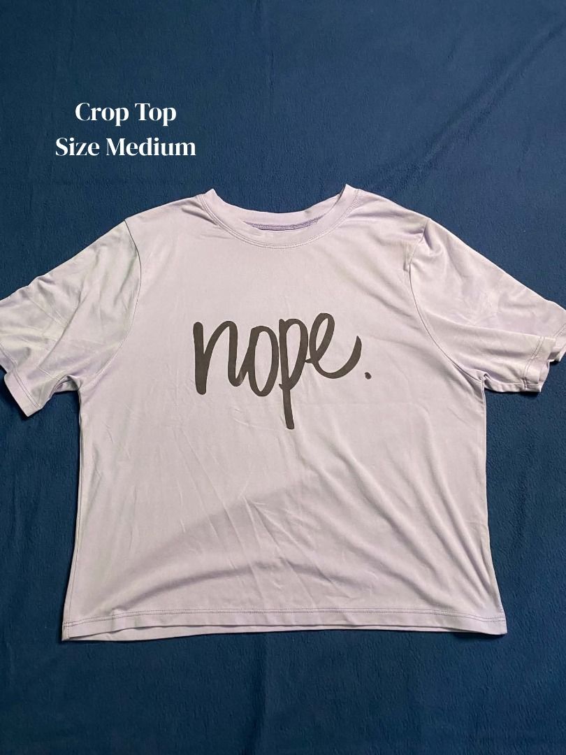 Purple Crop Top with Nope Graphic Size Medium (Category: Shirts) located in Santa Cruz, Pampanga. Submitted by jncthriftshop (Listing ID 1468630869, Image 1). Description: Please note that this item is pre-loved and not brand new. It may have minor signs of use, such as small stains, loose threads, slight fading, or other minor imperfections. Please manage your expectations and check all photos carefully before purchasing. -Condition: Pre-loved /