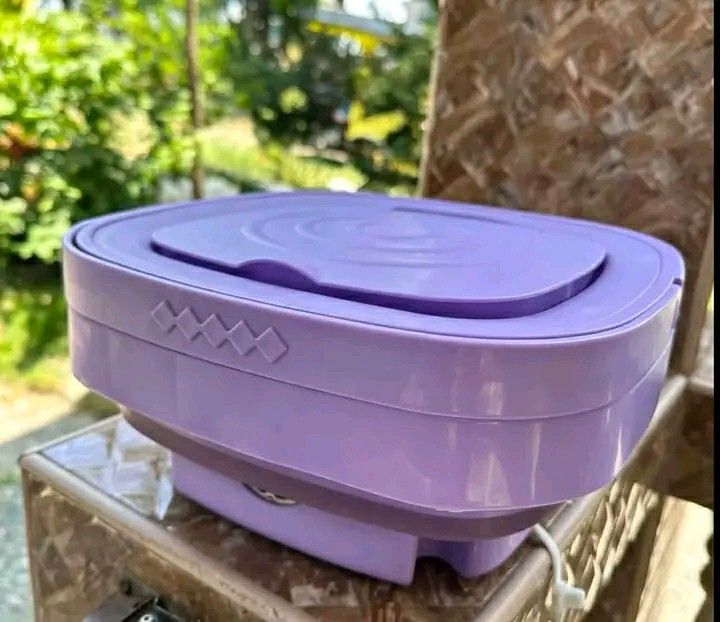 Purple Foldable Mini Washing Machine Portable Laundry Tub (Category: Washing Machines and Dryers) located in Manila. Submitted by wisecat_f7c143 (Listing ID 1468568757, Image 2). Description: New Arrival !!! Purple Foldable Mini Washing Machine Portable Laundry Tub pm me COD via lalamove.