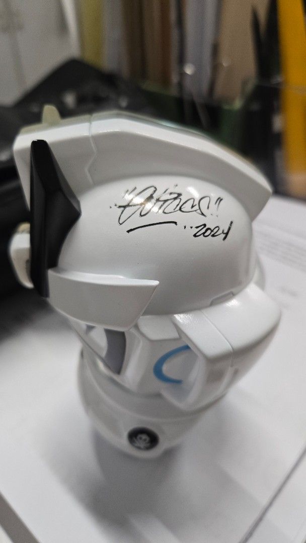 Quiccs CoreTeq NanoTeq (6") (Category: Designer & Blind Box Toys) located in Quezon City. Submitted by mrtenor (Listing ID 1468596329, Image 2). Description: - Authentic Bullet Punk Quiccs collectible figure -6 " - Colorway: White and translucent blue with signature helmet and clear outer suit - Signed on the back in black marker with year 2024 - Stands upright on feet - Condition: Clean, carefully displayed - Ideal for art toy and designer colle