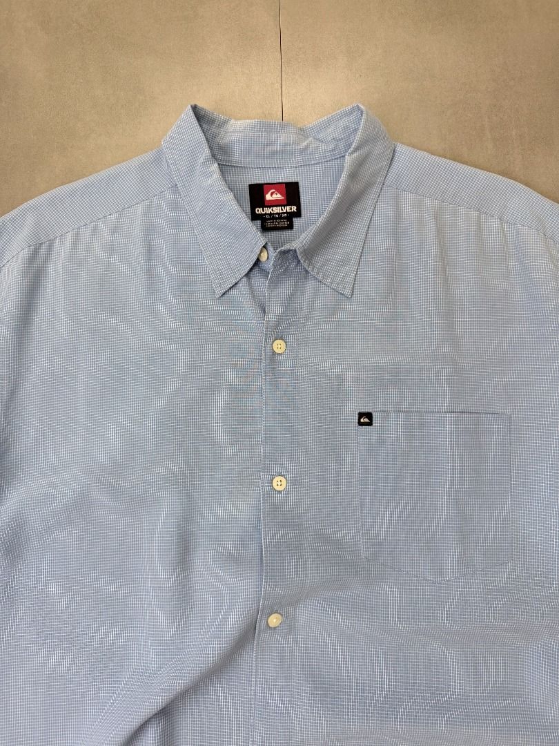Quiksilver Plaid polo (Category: Tshirts & Polo Shirts ) located in Cabanatuan. Submitted by argarments.ph (Listing ID 1468519186, Image 2). Description: Tagged: XL on tag Width 24" | Length 32" Condition: Great condition Issue(s): Small yellow stain. see photos.