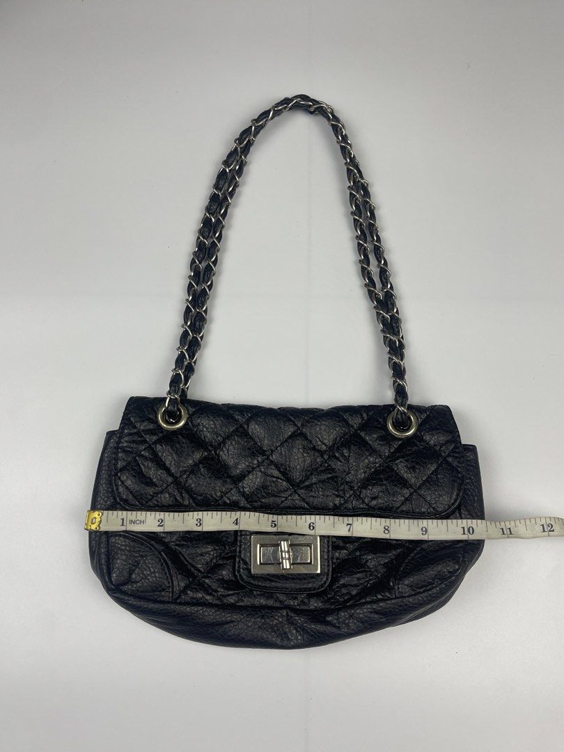 QUILTED TURN-LOCK CHAIN FLAP SHOULDER BAG (Category: Shoulder Bags) located in Cagayan de Oro. Submitted by kmcurations (Listing ID 1468551651, Image 2). Description: QUILTED TURN-LOCK CHAIN FLAP SHOULDER BAG Details & Dimensions: • Material: Soft crinkled / distressed faux leather with diamond quilting in classic black • Interior: Black fabric textile lining with an inner zip compartment • Hardware: Silver-tone Mademoiselle-style turn-lock clasp