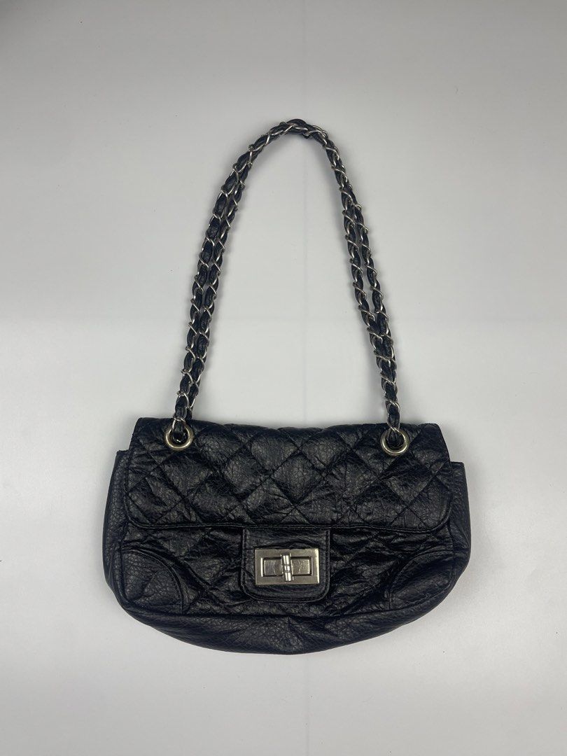 QUILTED TURN-LOCK CHAIN FLAP SHOULDER BAG (Category: Shoulder Bags) located in Cagayan de Oro. Submitted by kmcurations (Listing ID 1468551651, Image 1). Description: QUILTED TURN-LOCK CHAIN FLAP SHOULDER BAG Details & Dimensions: • Material: Soft crinkled / distressed faux leather with diamond quilting in classic black • Interior: Black fabric textile lining with an inner zip compartment • Hardware: Silver-tone Mademoiselle-style turn-lock clasp