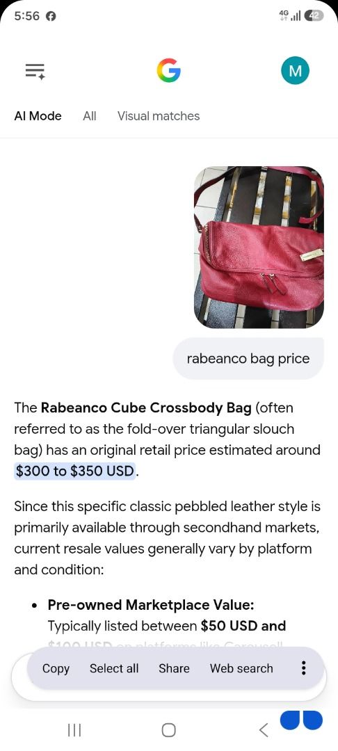 Rabeanco Cube Crossbody Bag Red Pebbled Leather (Category: Cross-body Bags) located in Caloocan City. Submitted by harrypotter0215 (Listing ID 1468519495, Image 2). Description: - Brand: Rabeanco - Material: Premium red pebbled leather - Style: Fold-over triangular slouch bag with shoulder strap - Hardware: Elegant gold-tone hardware and front brand tag - Features: Double zip details and a roomy interior - Condition: Great everyday purse for carr