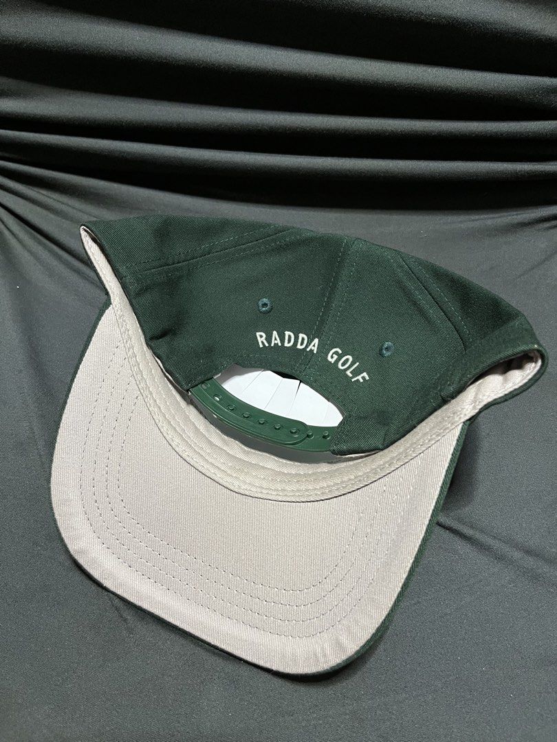 RADDA GOLF (Category: Caps & Hats) located in Quezon City. Submitted by headline. (Listing ID 1468681530, Image 2). Description: RADDA GOLF SNAPBACK DARK GREEN EXCELLENT CONDITION FOR ONLY:850php +SHIPPING FEE.