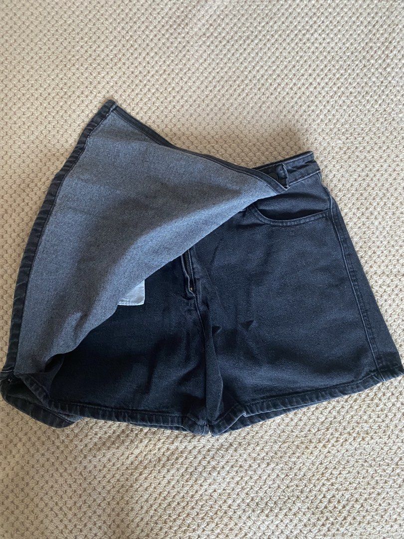Raleigh Denim Black Wrap Skort Size 32 (Category: Shorts) located in Rizal. Submitted by Shortlisted (Listing ID 1468509585, Image 3). Description: - Brand: Raleigh Denim - Size: 32 (Waist measures approx. 15.5 inches flat) - Details: Classic dark wash, contrast topstitching, button & zip closure, back pockets.
