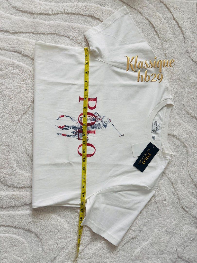Ralpg Lauren shirt (Category: Shirts) located in Lipa City. Submitted by klassique_handbags (Listing ID 1468576212, Image 3). Description: ✅Available✅ ❤️Ralph Lauren❤️ 💯cotton materials Big Pony & Polo Logo printed Crewneck Short sleeves (L) size 14-16 yrs old Can fit to adult small- medium 💯orginal sf not included courier Lbc📦 1,900 php Disclaimer: All trademarks, logos, and brand names mentioned or used in our products/services are the prope