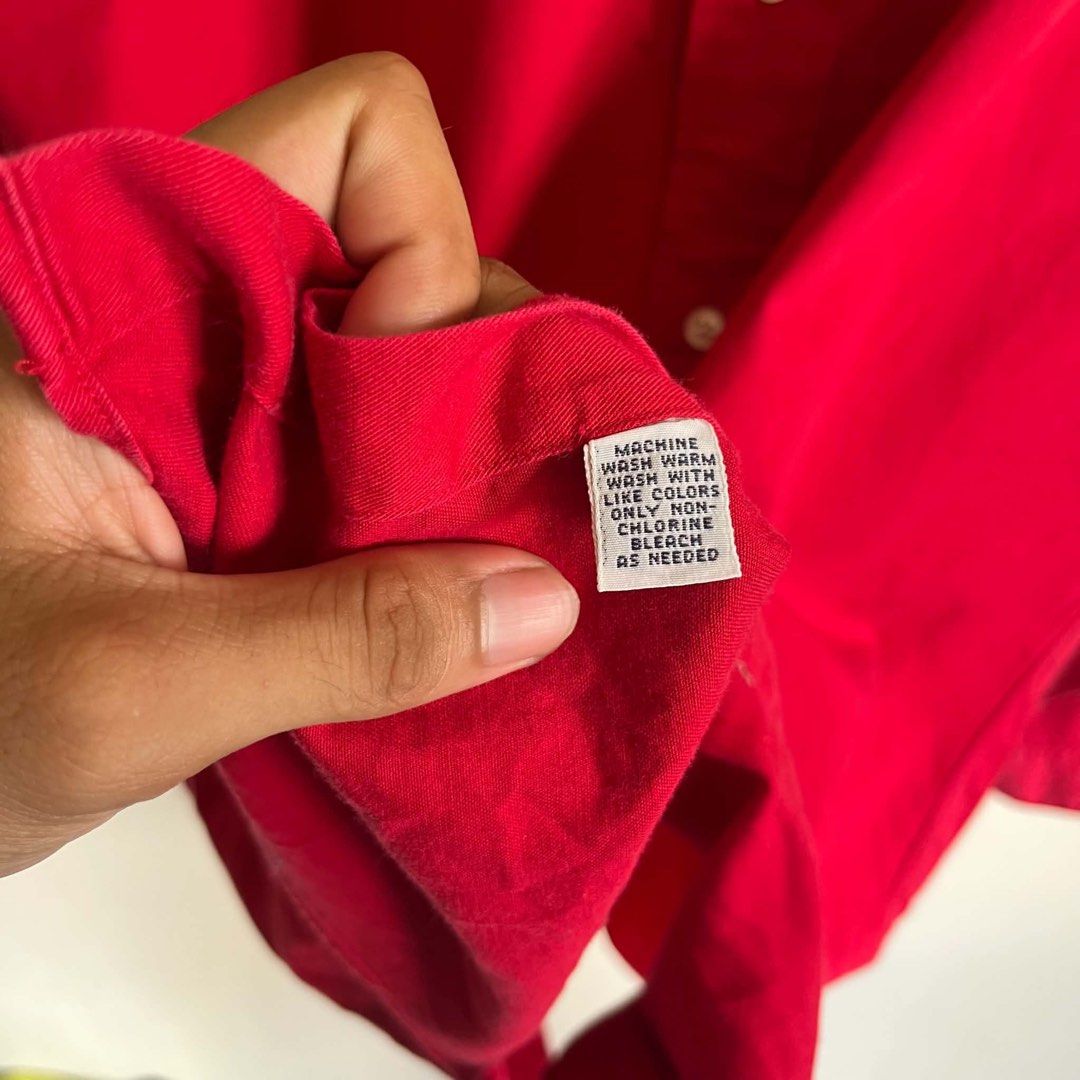 Ralph Lauren Blaire Red Button-Up Shirt Medium (Category: Tshirts & Polo Shirts ) located in San Fernando. Submitted by younglei (Listing ID 1468553278, Image 3). Description: - Brand: Ralph Lauren (Blaire model) - Color: Bright Red - Size: Medium (M) -Dimes: 24” width by 28” length - Material: 100% breathable cotton - Details: Classic collar, front button closure, iconic embroidered polo player logo on chest - Care: Machine washable - Condition: