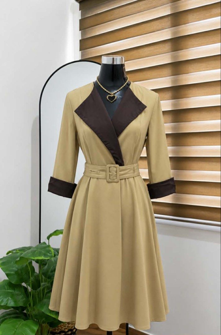 Rare dress #coatdress (Category: Dresses) located in Baliuag. Submitted by sirc_28 (Listing ID 1468626859, Image 1). Description: Color tan and dark brown contrast-collar A-line midi dress featuring 3/4 sleeves with dark brown cuffs, a matching fabric waist belt with a square buckle, and a flared skirt..