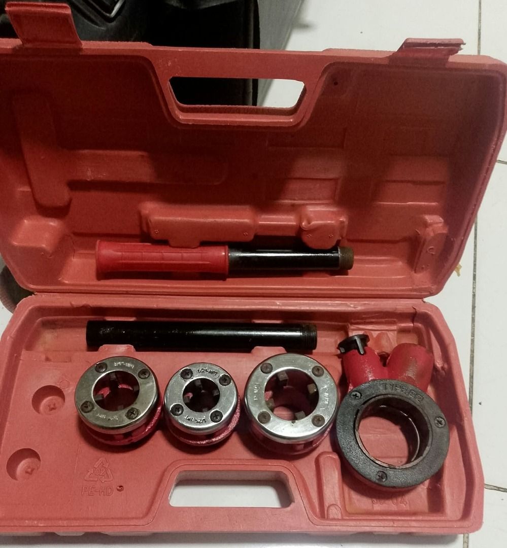 Ratchet Pipe Threader Set with Dies and Case (Category: Construction Tools & Equipment) located in Manila. Submitted by 1rom_sns (Listing ID 1468583390, Image 1). Description: - Manual pipe threader for size 1, 3/4 and 1/2 - Complete ratchet pipe threader kit in a durable red storage case - Includes handle pieces, ratchet head, and 3 interchangeable die heads - Metal parts show standard cosmetic wear from workshop use - Case included to keep all 