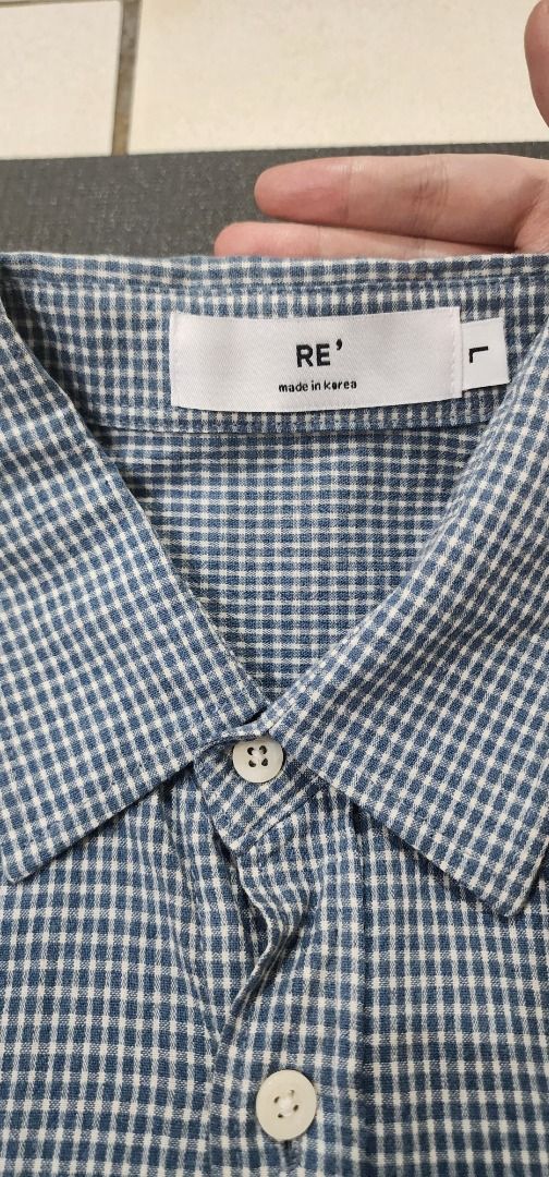 [RE'] Men's Blue Gingham Long Sleeve Button Up (Category: Formal Shirts) located in Manila. Submitted by bibimboop (Listing ID 1468548923, Image 2). Description: Also bought from S. Korea, used maybe 1-2 times. Just a bit wrinkly from a bad fold; the material is quite thin, and has a small front pocket. Shoulders: 17.5" Chest: 17" Length: 27.5" Sleeve length: 23.5" 🧧 Mode of Payment: Gcash or Cash (meet-ups) 📍 Meet-Ups: Robinsons Place Manila (