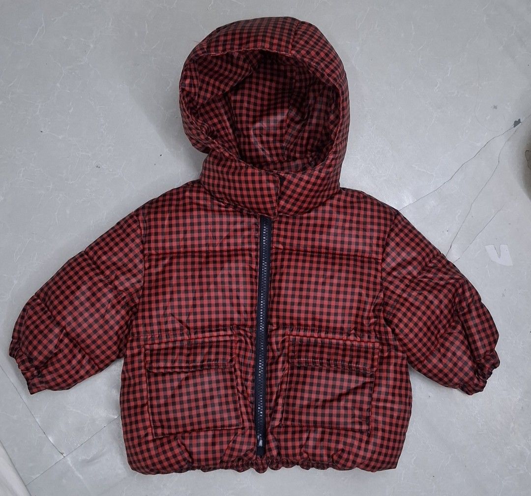 Red and black checkered hooded puffer jacket (Category: Babies & Kids Fashion) located in Pasay City. Submitted by al1son18 (Listing ID 1468609495, Image 1). Description: - Trendy red and black checkered design with a matching hood - Front zip closure and two handy front patch pockets - Thick inner padding and gathered hem to keep you extra warm - Puffed sleeves to lock in heat - Perfect for cold weather and casual outifts - 9 to 12months on tag 